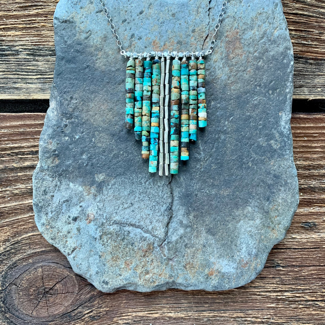 The turquoise waterfall necklace Raw turquoise beads and accents of silver.