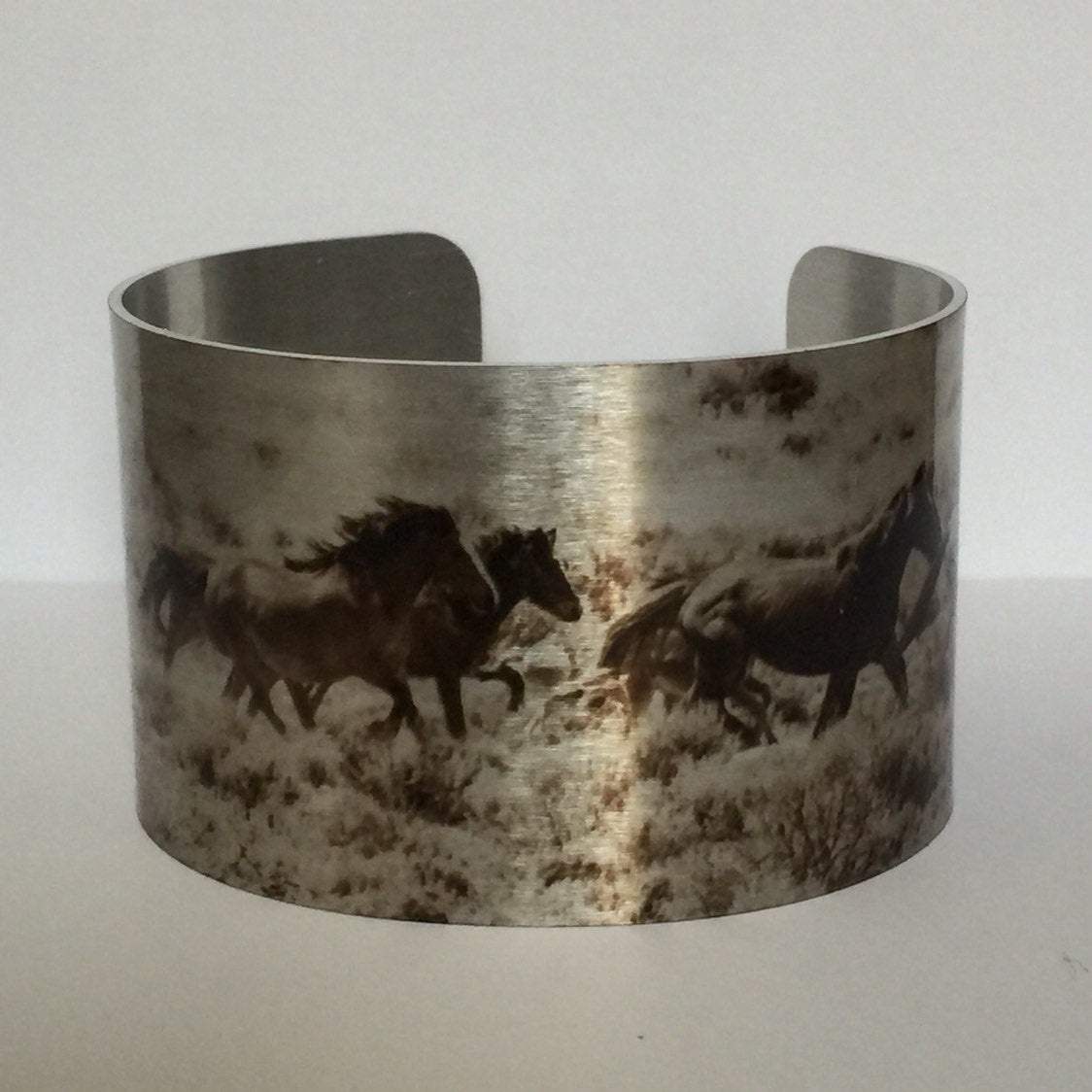 "Wild and Free” Aluminum Cuff Bracelet.