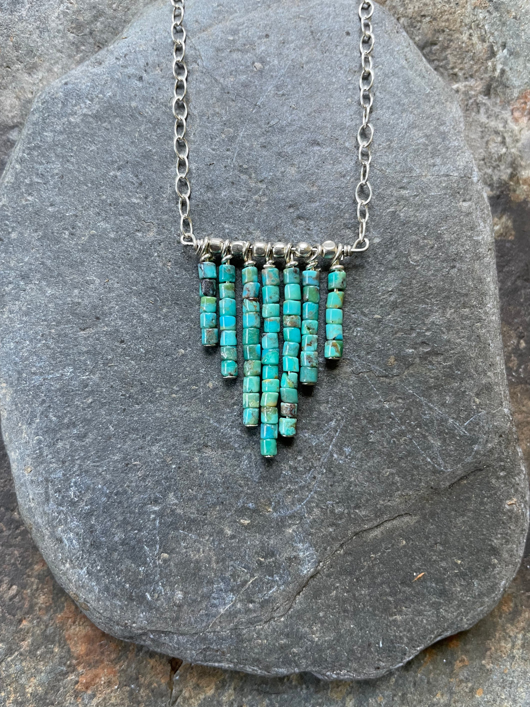 Turquoise waterfall necklace. Raw turquoise beads and accents of silver.
