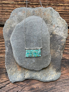 Turquoise waterfall necklace. Raw turquoise beads and accents of silver.
